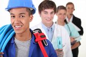 stock photo of leadership  - Four young people illustrating different career options - JPG 