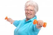 picture of fitness  - Happy senior woman making fitness training with dumbbells - JPG 