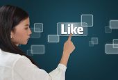 stock photo of computer technology  - Business woman pressing like button on screen - JPG 