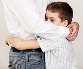 stock photo of family  - Father comforts a sad child - JPG 