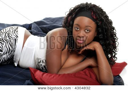 Sexy Jamaican Woman Lying In Bed Isolated | Stock photo. download preview Sexy Jamaican Woman Lying In Bed Isolated | Stock photo. download preview