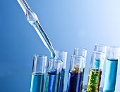 image of medical  - Test tubes closeup on blue background - JPG 