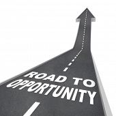 image of opportunity  - The words Road to Opportunity in white letters on a street leading to an arrow symbolizing change - JPG 