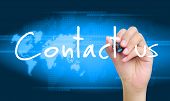 stock photo of future  - hand writing contact us on world map background - JPG 