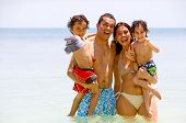 picture of family  - happy family having fun on vacation  - JPG 