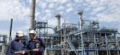 foto of industrial  - engineers and oil industrial panoramic view - JPG 
