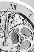 stock photo of watch  - black and white close view of watch hands and mechanism - JPG 
