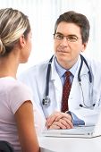 picture of medical doctors  - Medical doctor and young woman patient - JPG 