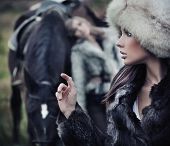 image of horse  - Two romantic female models posing with a horse - JPG 