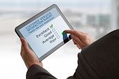 picture of survey  - Online customer service satisfaction survey on a digital tablet - JPG 
