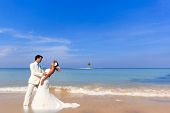 image of beach  - beautiful couple on the beach in wedding dress - JPG 