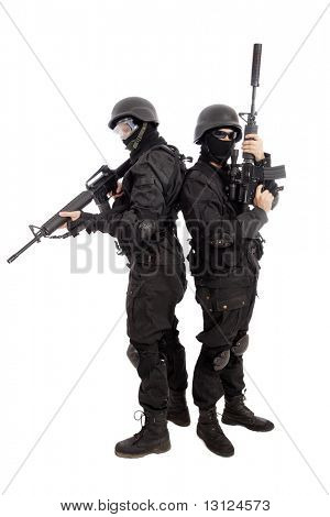 Shot of a soldier holding gun. Uniform conforms to special services(soldiers) of the NATO countries.