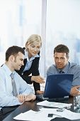 stock photo of business people  - Happy business people talking on meeting at office - JPG 