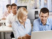 pic of associate  - Young business people sitting at desk - JPG 