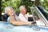image of sports  - Senior couple in sports car - JPG 