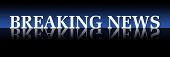 stock photo of news  - words breaking news over dark blue background - JPG 