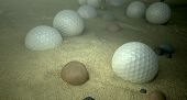 pic of embed  - An underwater scene of a golf water hazard with a few golf balls laying on the sand bottom - JPG 