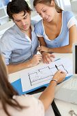 foto of meeting  - Couple meeting architect for plans of future home - JPG 