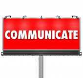 stock photo of communication  - A huge red outdoor billboard displays the word Communicate to share an idea - JPG 
