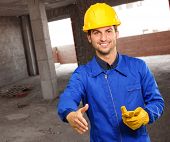 picture of handshake  - Young Engineer Offering Handshake - JPG 