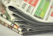 picture of newspaper  - news papers in a pile detail front of papers - JPG 