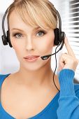 picture of helpline  - picture of friendly female helpline operator with headphones - JPG 