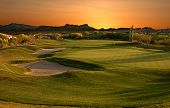 picture of golf  - The eighteenth hole on an Arizona golf course at sunset - JPG 
