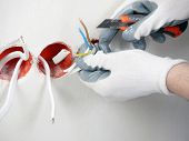 stock photo of wire  - Closeup of electrician - JPG 