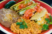 picture of food  - A colorful Mexican food plate with tacos bean and rice - JPG 