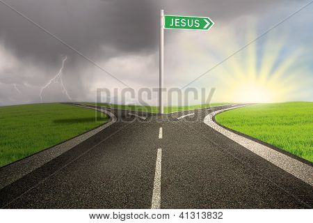 Picture or Photo of Highway with green road sign of Jesus name on stormy background