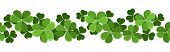 stock photo of holidays  - Vector illustration of horizontal seamless background with green shamrock - JPG 