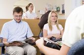 picture of wait  - People sat in dental waiting room - JPG 