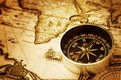 foto of map  - Compass on old map - JPG 