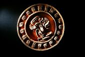stock photo of symbols  - A carved Mayan calendar in dramatic light - JPG 