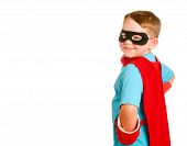 stock photo of kid  - Child pretending to be a superhero in studio image isolated on white - JPG 