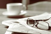 image of newspaper  - Newspapers and coffee cup - JPG 