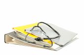image of medical  - Medical stethoscope with file folders on a white background - JPG 