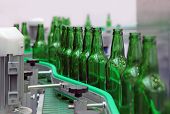 stock photo of technology  - Technological line for washing of glass bottles for beer
 - JPG 