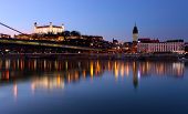stock photo of bridge  - Bratislava castle and novy bridge at sunset with reflection - JPG 
