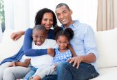 stock photo of family  - Portrait of a Smiling Afro - JPG 