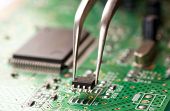 stock photo of circuit  - Assembling a circuit board - JPG 