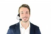 foto of telemarketing  - Young man telemarketing helpdesk customer service operator with headseet isolated - JPG 