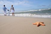 stock photo of beach  - Happy family on the beach - JPG 