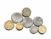 image of france  - stacks of french francs money coins and centimes in different values isolated on white top view ancient french currency - JPG 