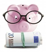 image of twenties  - Piggy bank isolated and twenty euro on white background - JPG 