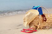 foto of beach  - Summer beach bag with straw hat - JPG 