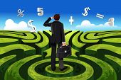 picture of financial  - A vector illustration of a businessman in maze facing a financial decision - JPG 