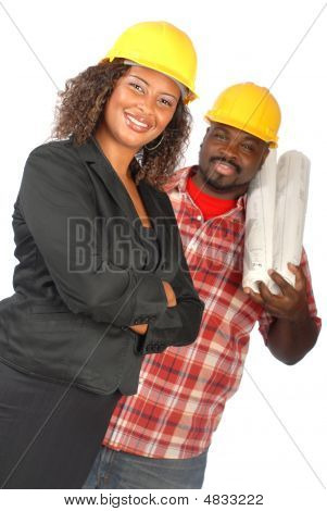 Picture or Photo of Standing team of female architect and construction worker on white background