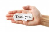 stock photo of objects  - Thank you or thanks concept with hand word and paper - JPG 