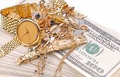 picture of watch  - conceptual image of the old jewelry on the money - JPG 
